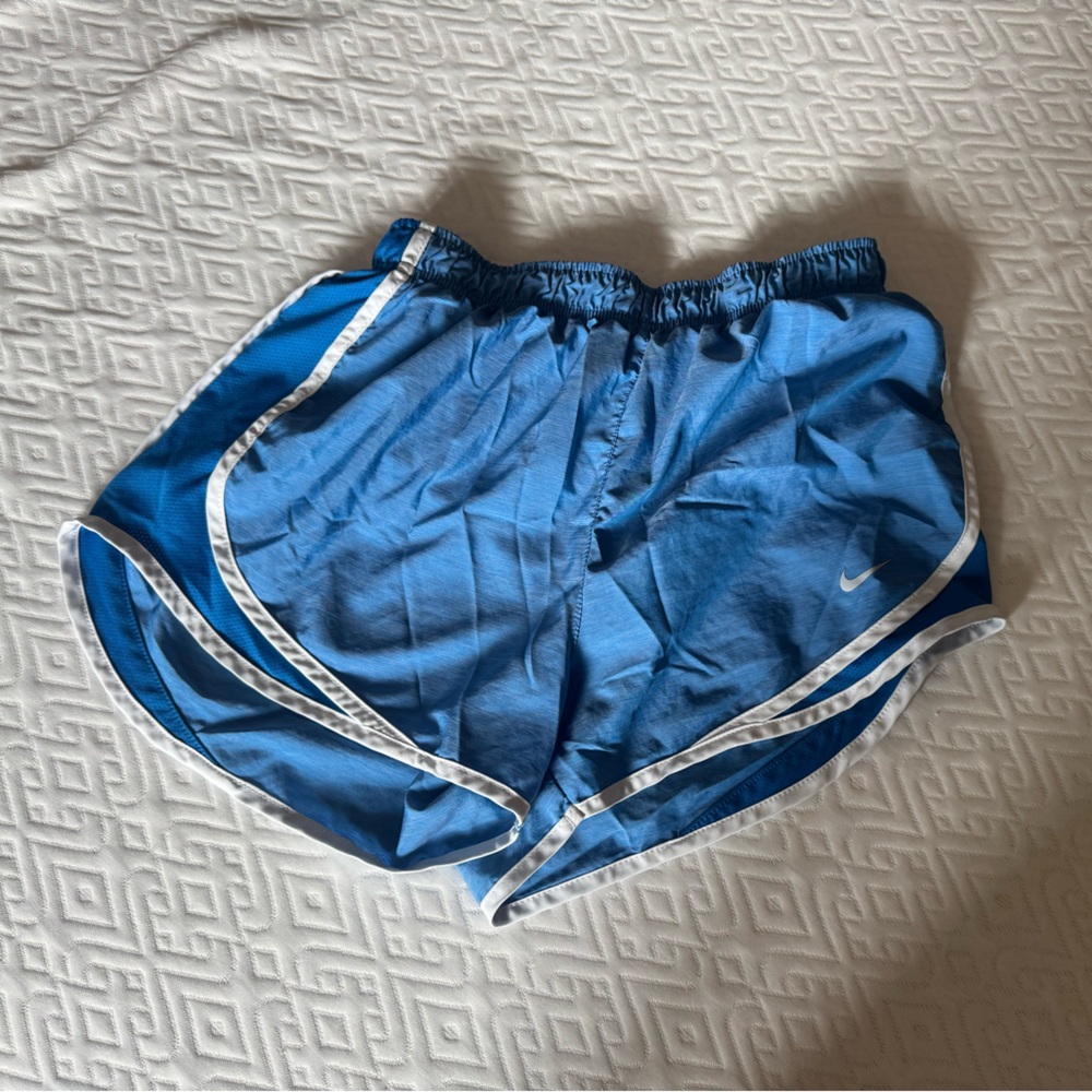 Blue Nike Athletic Shorts with White Trim